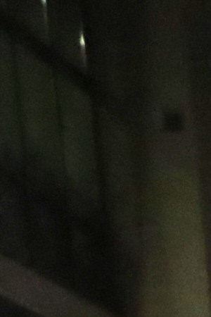 A demonstrator walks in front of a line of police officers during a protest sparked by the death of George Floyd while in police custody on May 29, 2020 in Oakland, California. Photo by Justin Sullivan/Getty Images