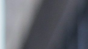 A football fan demonstrator holds a sign that reads "Our brother, George Floyd" as clashing with riot police during a protest against President of Brazil Jair Bolsonaro amidst the coronavirus pandemic at Paulista Avenue on May 31, 2020 in Sao Paulo, Brazil. Photo by Miguel Schincariol/Getty Images