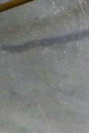 A nurse works in a makeshift tent triage center for patients suspected of being COVID-19 positive outside El Centro Regional Medical Center in hard-hit Imperial County on July 21, 2020 in El Centro, California. Photo by Mario Tama/Getty Images