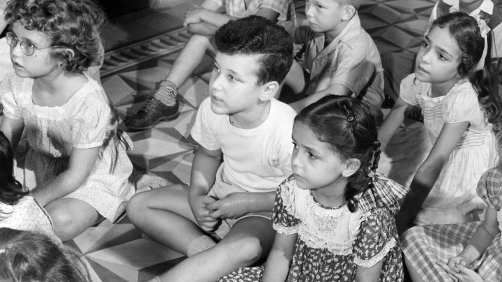 Circa 1955: Children in the first grade of the Robinson School, San Juan. Photo by Three Lions/Getty Images