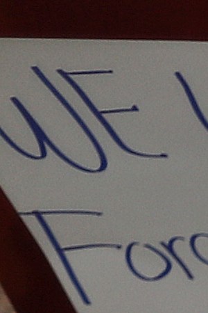 Flowers and mementos are seen at a makeshift memorial outside Walmart, near the scene of a mass shooting which left at least 20 people dead, on August 4, 2019 in El Paso, Texas. Photo by Mario Tama/Getty Images