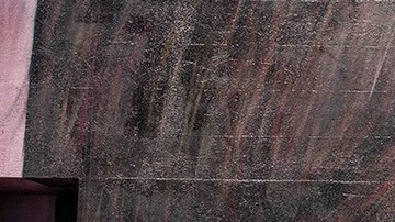 A girl scoots past a mural of Michelle Obama in Brixton on June 24, 2020 in London, England. Yesterday, the Prime Minister Boris Johnson announced the reopening of restaurants, pubs, hairdressers and hotels on July 04 and the introduction of a ‚Äúone metre plus‚Äù social distancing rule. Photo by Dan Kitwood/Getty Images