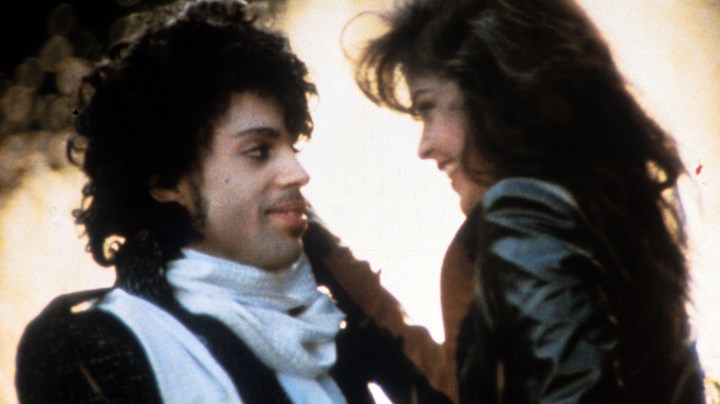 Prince embraces Apollonia Kotero in a scene from the film 'Purple Rain', 1984. Photo by Warner Brothers/Getty Images