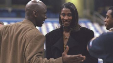 Guard Michael Jordan of the Chicago Bulls talks with Lisa Leslie before the NBA All-Star game. Credit: Brian Bahr/Allsport, Getty Images