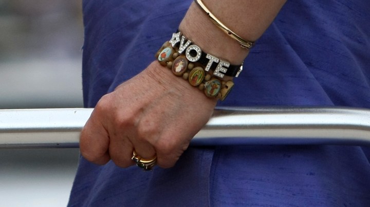 CAROLINA, PUERTO RICO - MAY 31: Democratic presidential hopeful U.S. Sen. Hillary Clinton (D-NY) wears a bracelet that says "vote" May 31, 2008 in Carolina, Puerto Rico. Senator Clinton is campaigning in Puerto Rico ahead of the caucus to be held on Sunday. (Photo by Justin Sullivan/Getty Images)