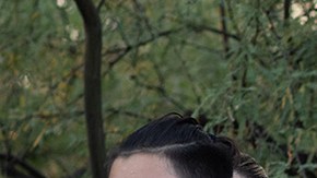 Community members and family wear shirts that read "Nana Ayudame or Nana, help me" in Spanish at a vigil for Carlos Adrián Ingram Lopez on June 25, 2020 in Tucson, Arizona. Photo by Caitlin O'Hara/Getty Images