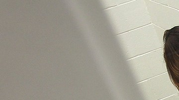 An undocumented Mexican immigrant waits to be deported from the Immigration and Customs Enforcement (ICE), center on April 28, 2010 in Phoenix, Arizona. Photo by John Moore/Getty Images