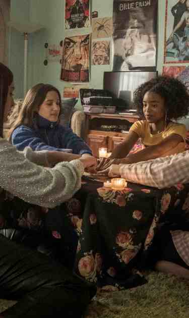 (l-r) Lourdes (Zoey Luna)  Frankie (Gideon Adlon)  Tabby (Lovie Simone) and Lily (Cailee Spaeny) perform rituals and talk about being cautious with their gifts in Columbia Pictures' THE CRAFT: LEGACY.