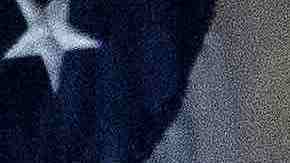 U.S. President Donald Trump leads first lady Melania Trump off the podium as he prepares to deliver his acceptance speech for the Republican presidential nomination on the South Lawn of the White House August 27, 2020 in Washington, DC. Trump gave the speech in front of 1500 invited guests. Photo by Chip Somodevilla/Getty Images