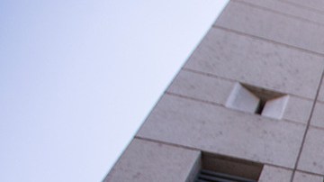 People demonstrate and call out words of encouragement to detainees held inside the Metropolitan Detention Center after marching to decry Trump administration immigration and refugee policies on June 30, 2018 in Los Angeles, California. Photo by David McNew/Getty Images.