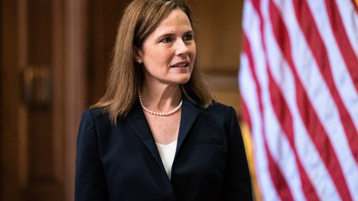 Supreme Court nominee Judge Amy Coney Barrett poses for a photo with Sen. Photo by Anna Moneymaker-Pool/Getty Images