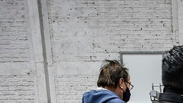 Electoral officers count the ballots at Amunategui High School during Constitutional Referendum on October 25, 2020 in Santiago, Chile. Photo by Claudio Santana/Getty Images
