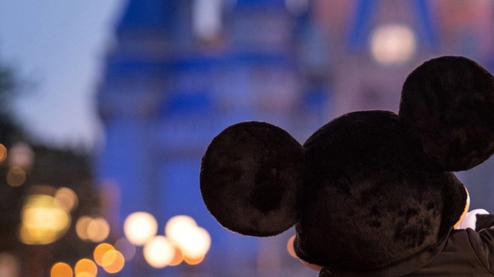 Mickey Mouse walks down Main Street, U.S.A. just before sunrise at Walt Disney World Resort on July 11, 2020 in Lake Buena Vista, Florida. Photo by Kent Phillips/Walt Disney World Resort via Getty Images