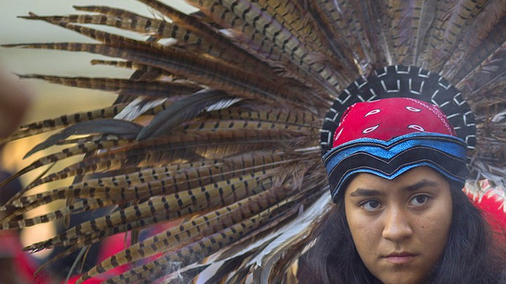 A student of Anahuacalmecac International University Preparatory of North America school for indigenous students holds incense during an event celebrating Indigenous Peoples Day in the Hollywood area on October 8, 2017 of Los Angeles, California. Photo by David McNew/Getty Images.