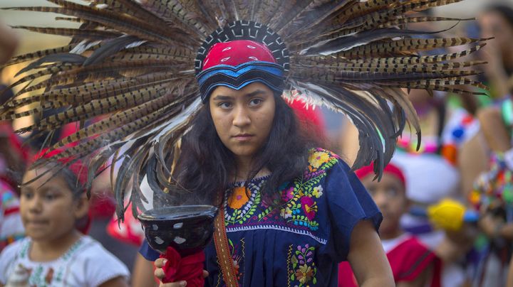 A student of Anahuacalmecac International University Preparatory of North America school for indigenous students holds incense during an event celebrating Indigenous Peoples Day in the Hollywood area on October 8, 2017 of Los Angeles, California. Photo by David McNew/Getty Images.