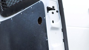 A child watches as a U.S. Border Patrol agent searches a fellow Central American immigrant after they crossed the border from Mexico on February 01, 2019 in El Paso, Texas. Photo by John Moore/Getty Images