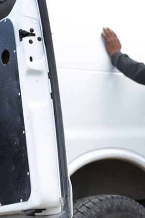 A child watches as a U.S. Border Patrol agent searches a fellow Central American immigrant after they crossed the border from Mexico on February 01, 2019 in El Paso, Texas. Photo by John Moore/Getty Images