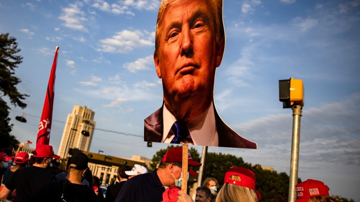 Supporters of President Donald Trump gather outside of Walter Reed National Military Medical Center after the President was admitted for treatment of COVID-19 on October 4, 2020 in Bethesda, Maryland. Photo by Samuel Corum/Getty Images