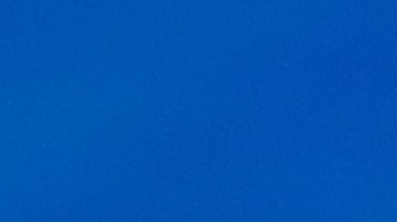 U.S. President-elect Joe Biden removes his protective mask as he addresses the media after a virtual meeting with the National Governors Association's executive committee at the Queen Theater on November 19, 2020 in Wilmington, Delaware. Photo by Joe Raedle/Getty Images