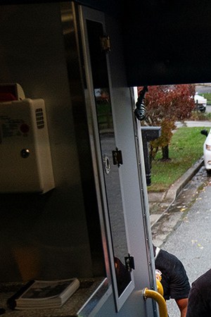 Firefighters and paramedics with Anne Arundel County Fire Department load a patient into an ambulance while responding to a 911 emergency call on November 11, 2020 in Glen Burnie, Maryland. Photo by Alex Edelman/Getty Images
