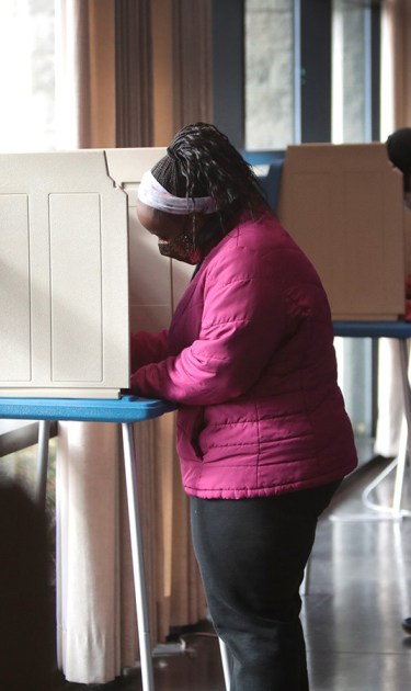 Residents vote at a polling place set up for early voting on November 01, 2020 in Racine, Wisconsin. Photo by Scott Olson/Getty Images