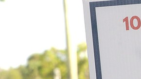 Wearing a face masks to reduce the risk posed by the coronavirus, Sophia Hildalgo (L) and Amore Rodriguez of Miami stay with their car decorated in Cubans for Biden paint as Democratic presidential nominee Joe Biden delivers remarks during a drive-in voter mobilization event at Miramar Regional Park October 13, 2020 in Miramar, Florida. Photo by Chip Somodevilla/Getty Images