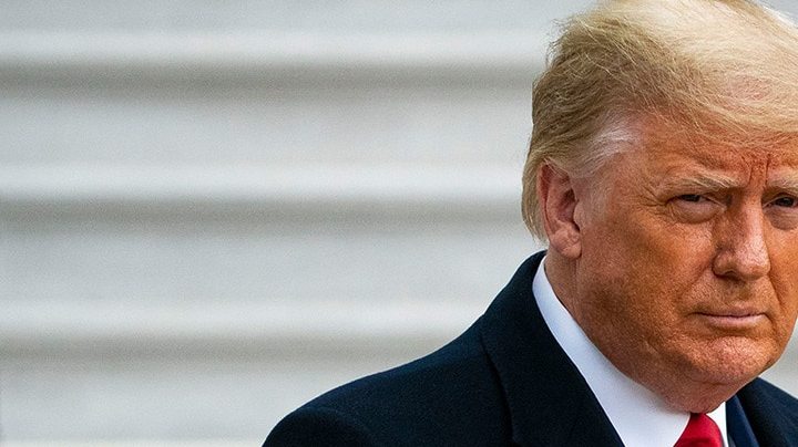 U.S. President Donald Trump gives a thumbs up as he departs on the South Lawn of the White House, on December 12, 2020 in Washington, DC. Photo by Al Drago/Getty Images