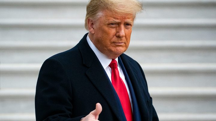 U.S. President Donald Trump gives a thumbs up as he departs on the South Lawn of the White House, on December 12, 2020 in Washington, DC. Photo by Al Drago/Getty Images