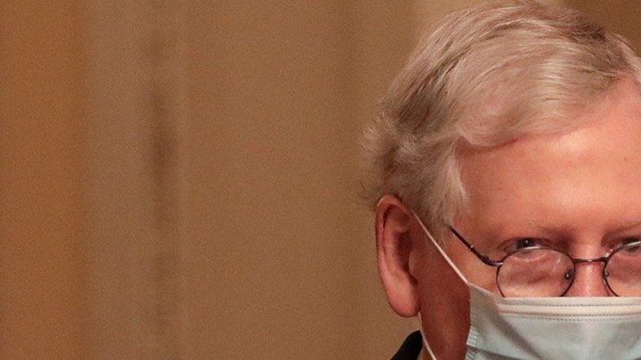 Senate Majority Leader Mitch McConnell (R-KY) walks to his office after leaving the Senate Floor at the U.S. Capitol on December 21, 2020 in Washington, DC. Photo by Cheriss May/Getty Images