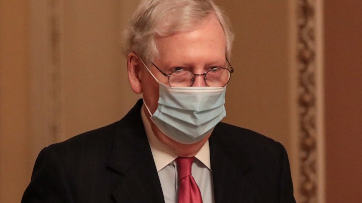 Senate Majority Leader Mitch McConnell (R-KY) walks to his office after leaving the Senate Floor at the U.S. Capitol on December 21, 2020 in Washington, DC. Photo by Cheriss May/Getty Images