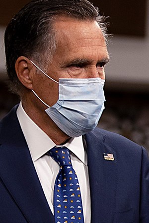 Sen. Mitt Romney (R-UT), US Rep. Abigail Spanberger (D-VA) and US Rep. Dean Phillips (D-MN) alongside a bipartisan group of Democrat and Republican members of Congress as they announce a proposal for a Covid-19 relief bill on Capitol Hill on December 01, 2020 in Washington, DC. Photo by Tasos Katopodis/Getty Images