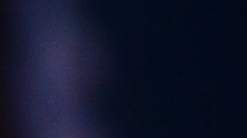 U.S. President-elect Joe Biden removes his face mask before delivering remarks on the ongoing coronavirus (COVID-19) pandemic at the Queen Theater on December 29, 2020 in Wilmington, Delaware. Photo by Mark Makela/Getty Images