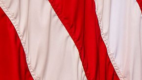 A sculpted bust of Cesar Chavez oversees a collection of personal framed photos on a table seen during an early preview of the redesigned Oval Office awaiting President Joseph Biden at the White House in Washington, DC. (Photo by Bill O'Leary/The Washington Post via Getty Images)