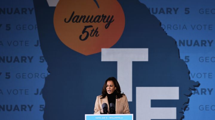SAVANNAH, GEORGIA - JANUARY 03: Vice President-elect Kamala Harris speaks during a drive-in rally at Garden City Stadium on January 03, 2021 in Savannah, Georgia. Vice President-elect Kamala Harris joined Georgia Democratic Senate candidates Rev. Raphael Warnock and Jon Ossoff for a campaign event two days before the January 5th runoff election that has implications into which party controls the U.S. Senate. According to AJC, 3 million people have already casted their votes ahead of Tuesday's election.  (Photo by Michael M. Santiago/Getty Images)