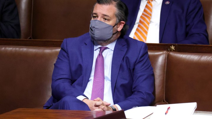 Sen. Ted Cruz (R-TX) stands in the House Chamber during a reconvening of a joint session of Congress on January 06, 2021 in Washington, DC. Photo by Win McNamee/Getty Images