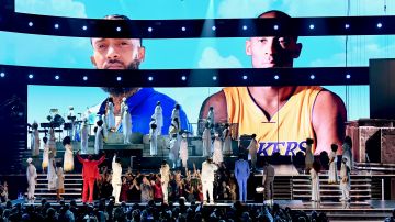 LOS ANGELES, CALIFORNIA - JANUARY 26: Images for the late Nipsey Hussle and Kobe Bryant are projected onto a screen while YG, John Legend, Kirk Franklin, DJ Khaled, Meek Mill, and Roddy Ricch perform onstage during the 62nd Annual GRAMMY Awards at STAPLES Center on January 26, 2020 in Los Angeles, California. (Photo by Kevin Winter/Getty Images for The Recording Academy )Meek Mill