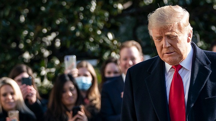 U.S. President Donald Trump turns to reporters as he exits the White House to walk toward Marine One on the South Lawn on January 12, 2021 in Washington, DC. Photo by Drew Angerer/Getty Images.