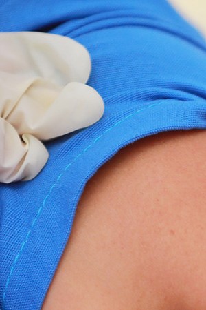 A medical worker receives the Pfizer/BioNTech vaccine as part of Mexico COVID-19 vaccination plan at 81st Infantry Batallion facilities on December 28, 2020 in Mexico City, Mexico. Photo by Manuel Velasquez/Getty Images