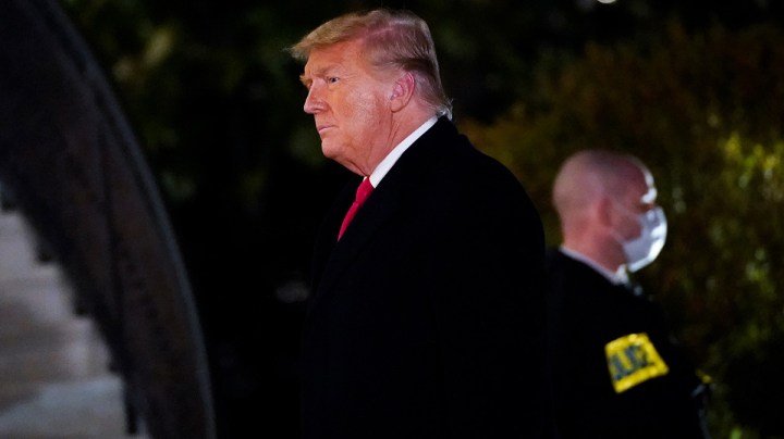 U.S. President Donald Trump walks to the White House residence after exiting Marine One upon his return on January 12, 2021 in Washington, DC. Photo by Drew Angerer/Getty Images