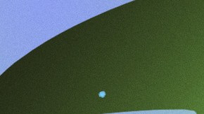 Cardi B posing with hands on chin.