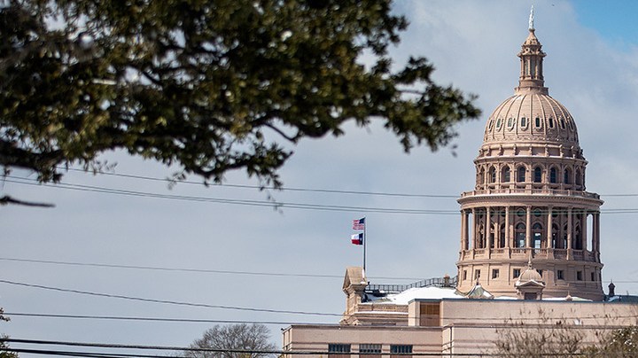 The Texas Capitol is surrounded by snow in on February 15, 2021 in Austin, Texas. Photo by Montinique Monroe/Getty Images