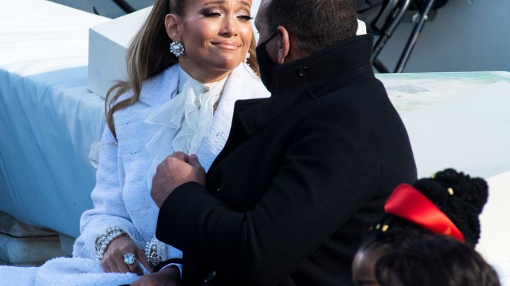 Jennifer Lopez talks with her husband Alex Rodriguez, after she performed at the inauguration before Joe Biden was sworn in as the 46th President of the United States on the West Front of the U.S. Capitol on Wednesday (Photo By Tom Williams/CQ-Roll Call, Inc via Getty Images)