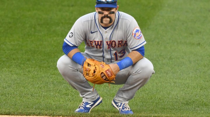 Luis Guillorme #13 of the New York Mets looks on during a baseball game against the Washington Nationals at Nationals Park on September 27, 2020 in Washington, DC. (Photo by Mitchell Layton/Getty Images)