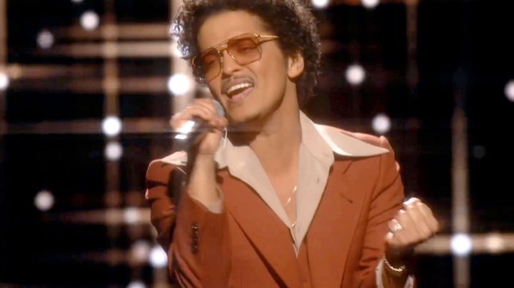 In this screengrab released on March 14, Bruno Mars of music group Silk Sonic performs onstage during the 63rd Annual GRAMMY Awards broadcast on March 14, 2021. (Photo by Theo Wargo/Getty Images for The Recording Academy)