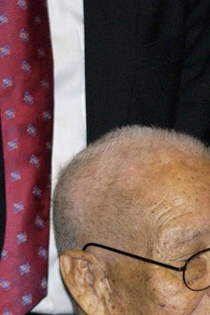 Retired US Army (USA) Sergeant First Class (SFC) Jose Mendoza Lopez, Medal of Honor Recipient, World War II (WWII), receives a decoration presented by USA Lieutenant General (LGEN) Richardo Sanchez, Commander, 5th Corps, at the Department of Defense Armed Forces Awards Breakfast, held during the 75th Annual League of United Latin American Citizens (LULAC), National Convention and Exposition at the Henry B. Gonzalez Convention Center in San Antonio, Texas (TX)