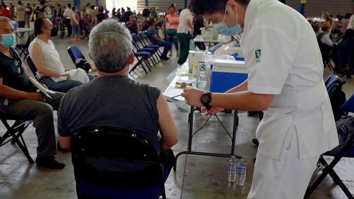 A nurse gives a shot of the Russian Sputnik V vaccine against COVID-19 at Sports Palace in Mexico City, on February 28, 2021. (Photo by ALFREDO ESTRELLA / AFP) Photo by ALFREDO ESTRELLA/AFP via Getty Images