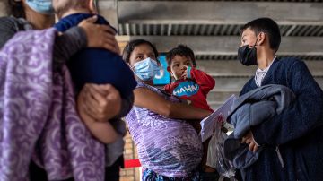 Central American asylum seekers arrive to a bus station after being released by U.S. Border Patrol agents on February 26, 2021 in Brownsville, Texas. U.S. immigration authorities are now releasing many asylum seeking families after they cross the U.S.-Mexico border and are taken into custody. Photo by John Moore/Getty Images