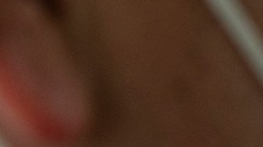 A man smokes a joint at the esplanade of the Estela de Luz monument in Mexico City, on March 10, 2021. Photo by CLAUDIO CRUZ/AFP via Getty Images