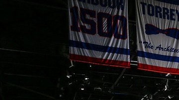 New York Islanders and the Philadelphia Flyers stand during the National Anthem at Nassau Coliseum on March 18, 2021 in Uniondale, New York. Philadelphia Flyers defeated the New York Islanders 4-3. Photo by Mike Stobe/NHLI via Getty Images