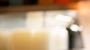 A cook at Arnaldo Richards' Picos wears gloves and a mask while cooking orders amid the coronavirus pandemic May 1, 2020 in Houston, Texas. Photo by MARK FELIX/AFP /AFP via Getty Images